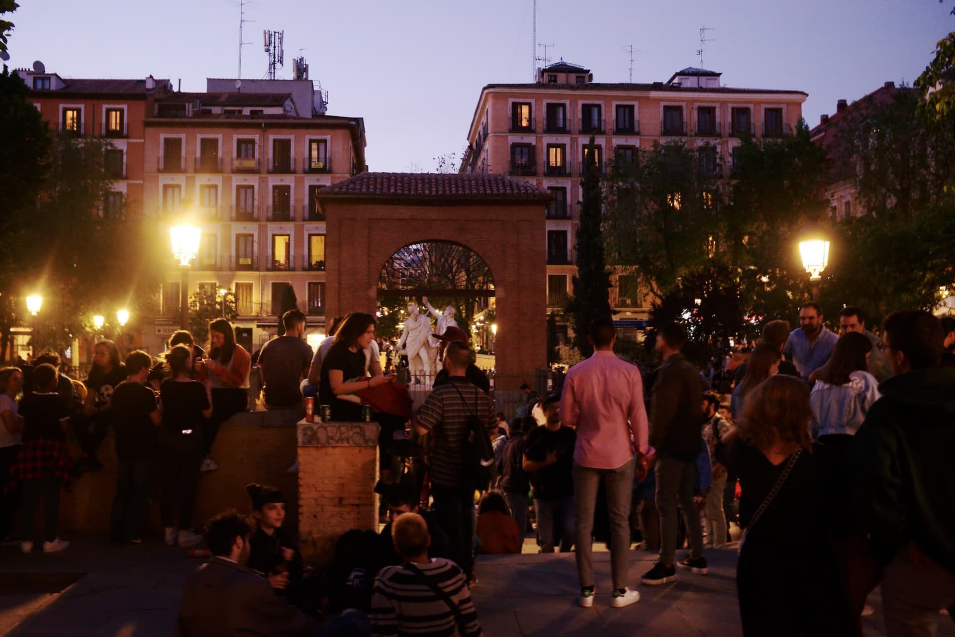 People filling Plaza del Dos de Mayo in Malasaña, Madrid, during the neighbourhood's spring street party.